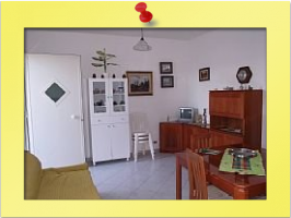 soggiorno con divanoletto da una piazza e mezza